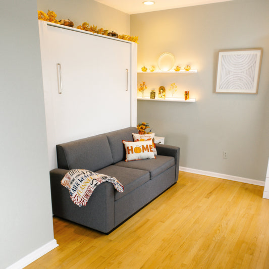 sofa wall bed decorated for fall