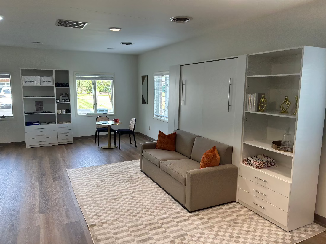 showroom with cabinets and a sofa wall bed