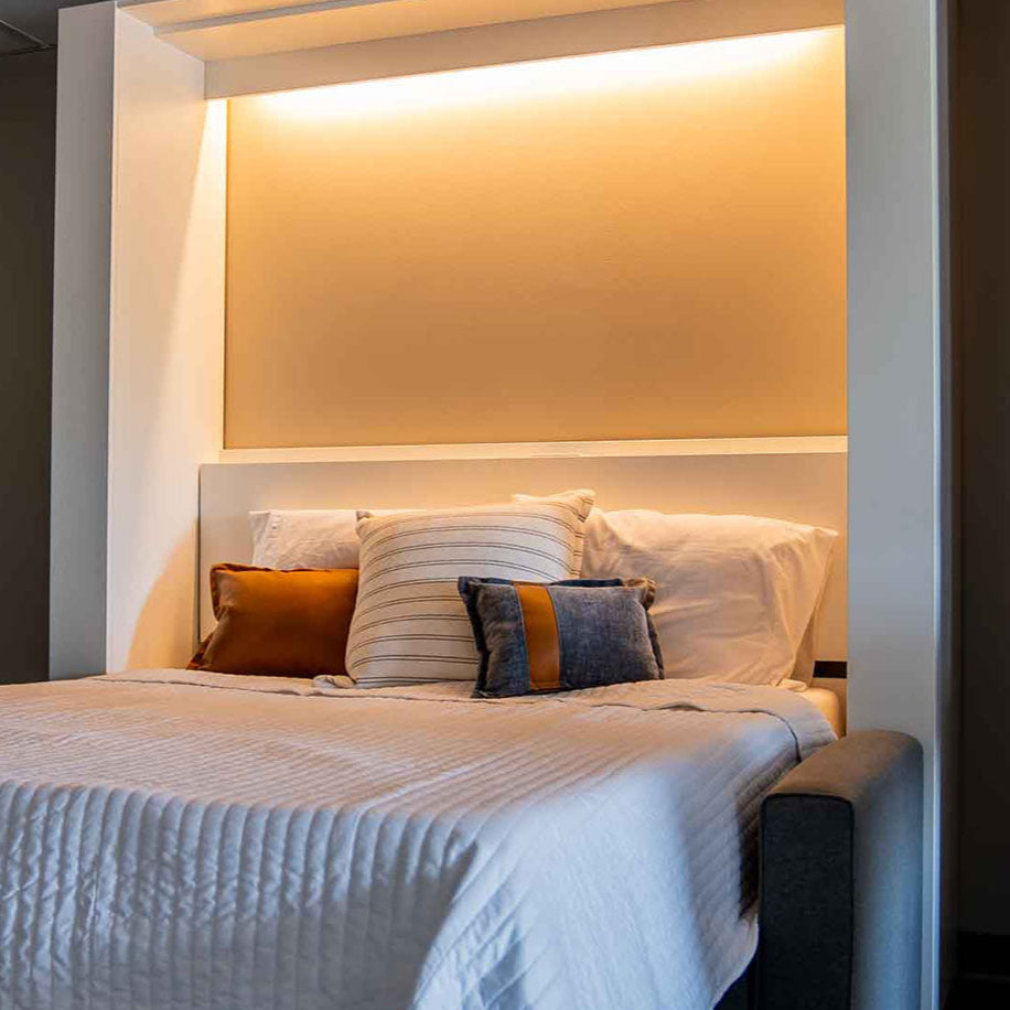 Lights on above a bed