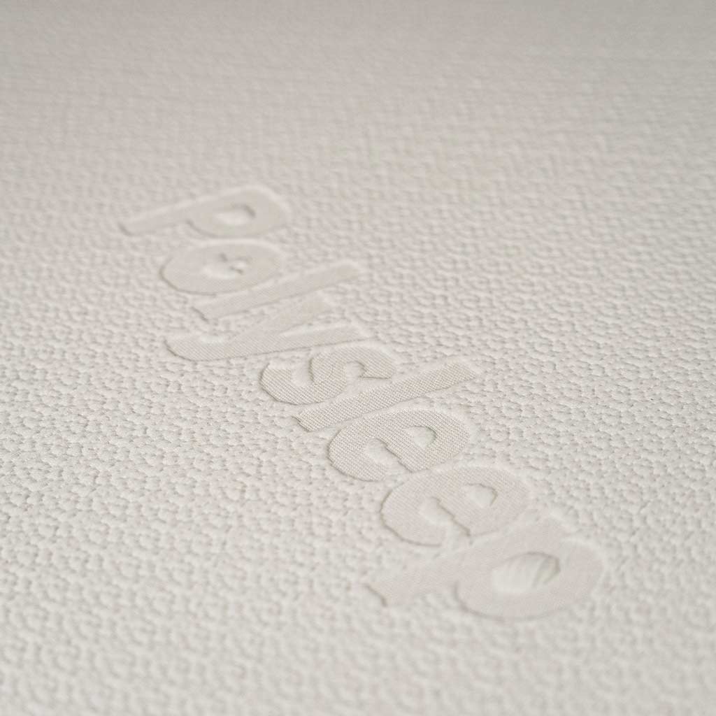 fabric close up of Polysleep mattress that reads Polysleep