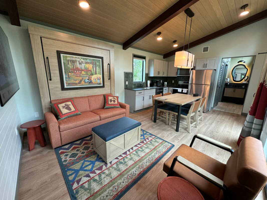 Overview of the interior of The Cabins at Disney’s Fort Wilderness Resort with an Inovabed