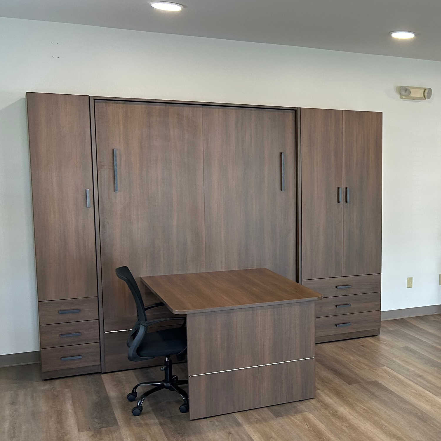 dark brown table bed with desk and 2 side cabinets