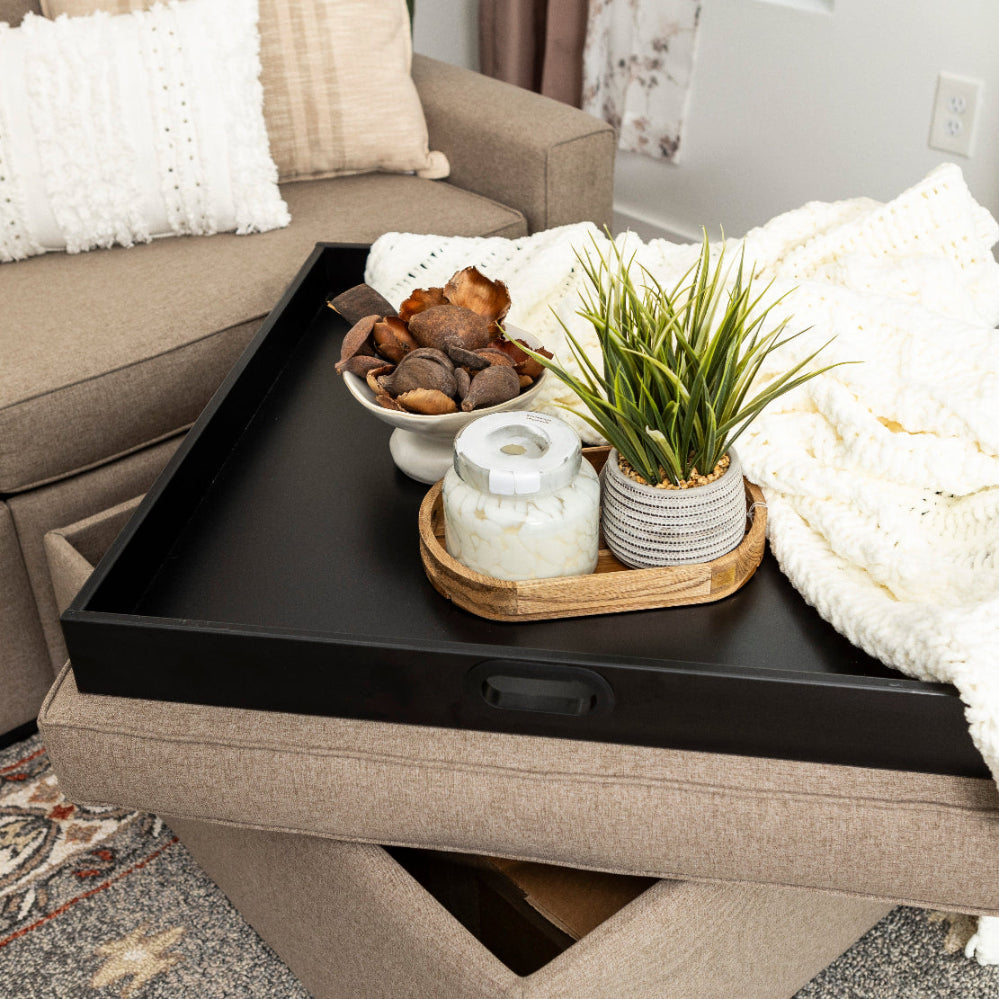 ottoman with decorative items in a living room setting