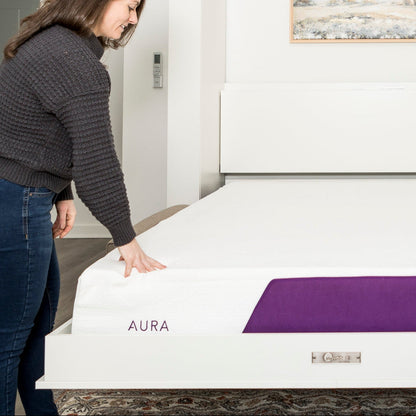 woman touching a polysleep mattress