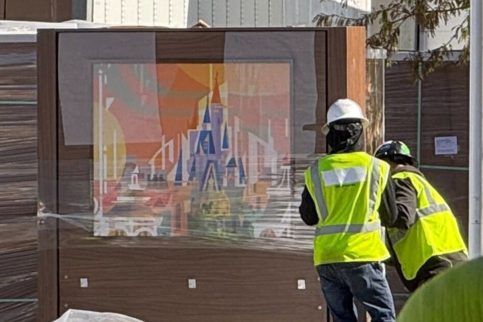 workers moving a bed outside