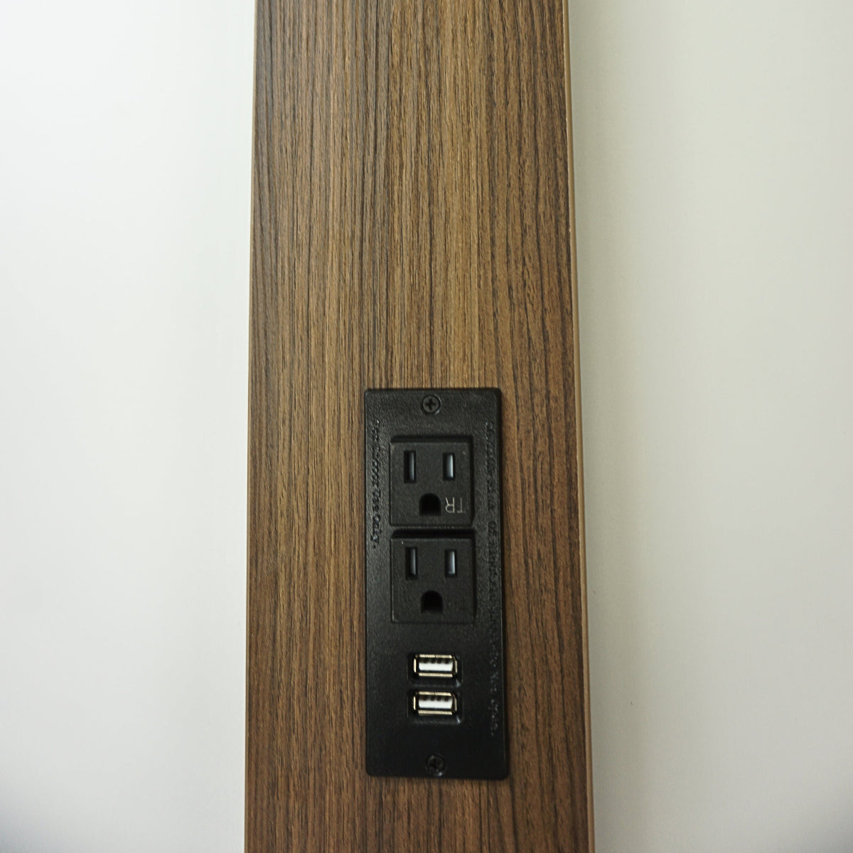 Black power hub on Modern Walnut laminate