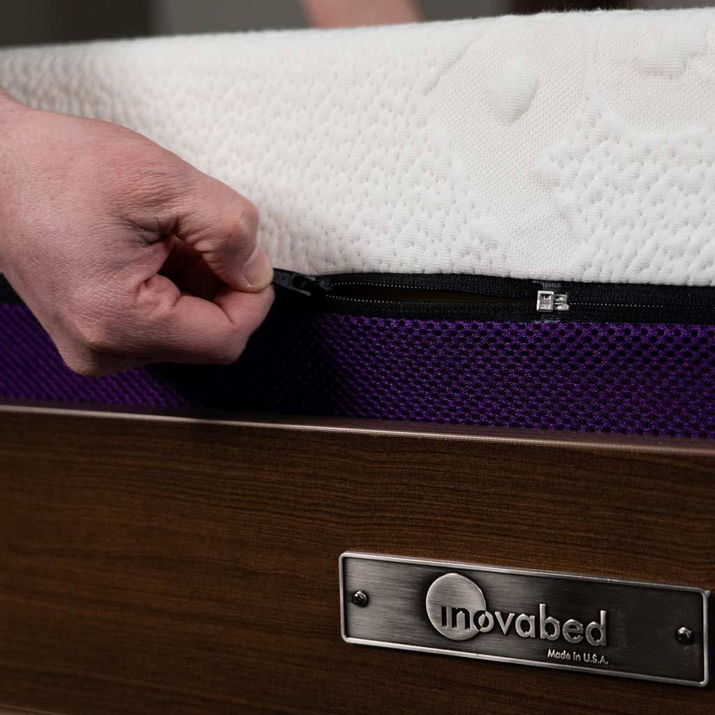 hand unzipping Polysleep 10" mattress cover