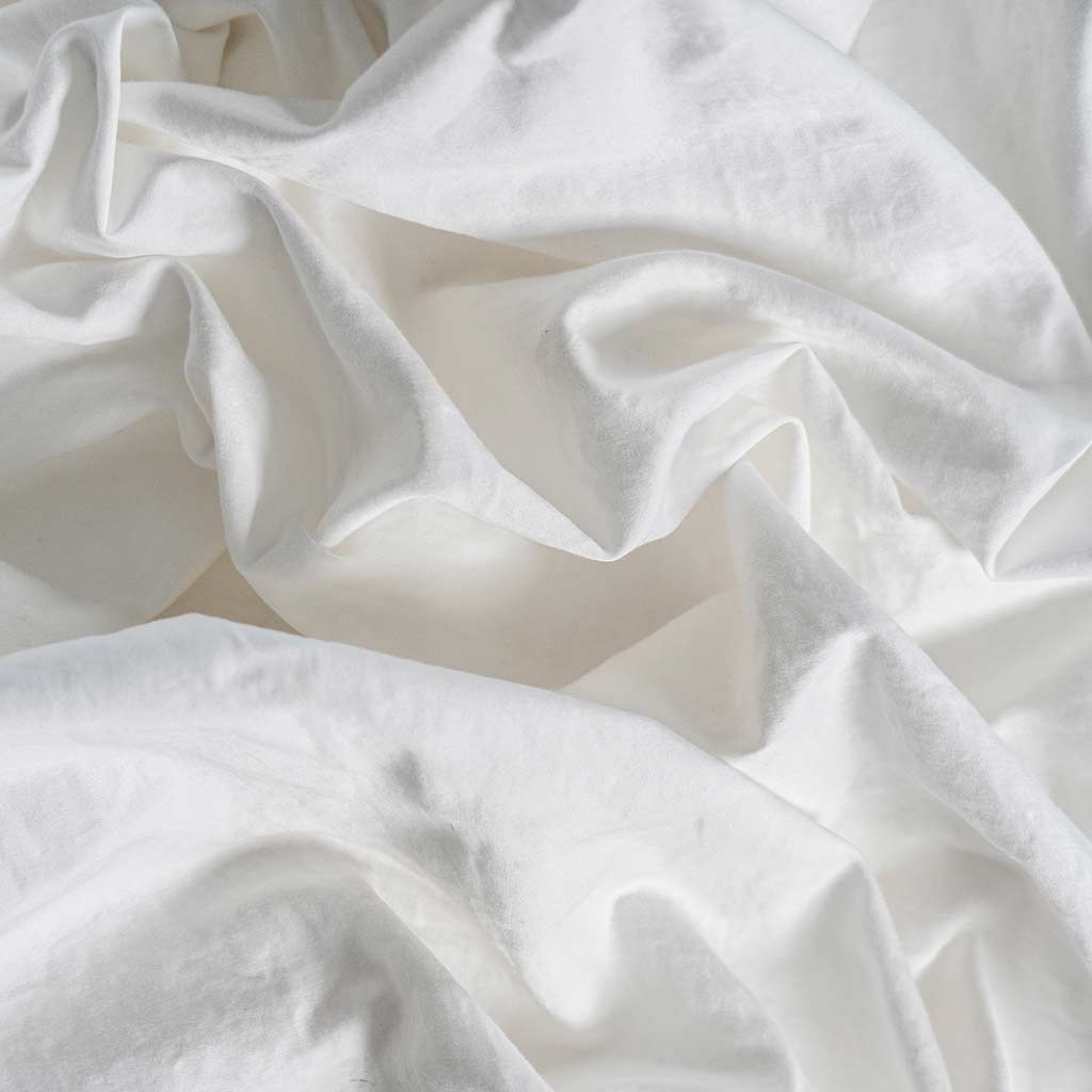 Detail shot of Inovabed Home Collection - Queen Sheet Set sheet crumpled up showing it's soft texture.