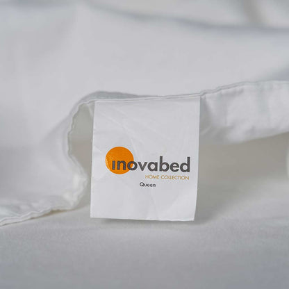 Close up of the tag of the Inovabed Home Collection - Queen Sheet Set
