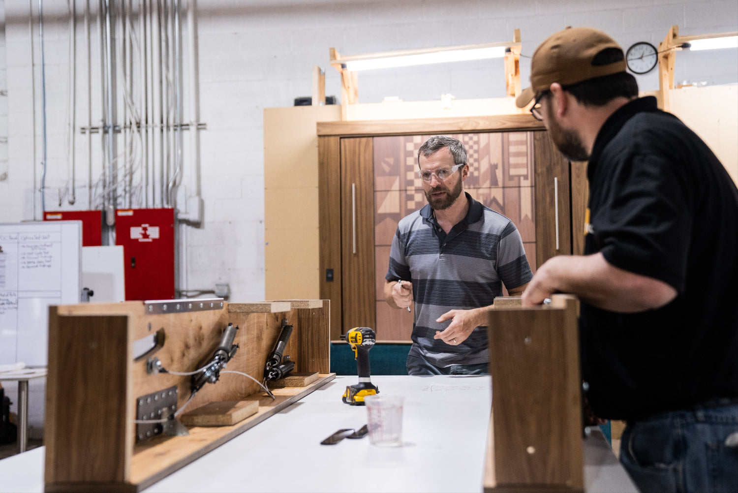two men working at a factory